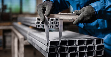 Frabricator working with metal posts